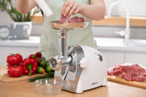 ARDESTO Meat grinder, 2000W, prod.-1.9kg/min, 3 cutting plates+for sausag.plates, 3 vegetable slicer, plastik, black-silver