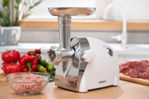 ARDESTO Meat grinder, 2000W, prod.-1.9kg/min, 3 cutting plates+for sausag.plates, 3 vegetable slicer, plastik, black-silver